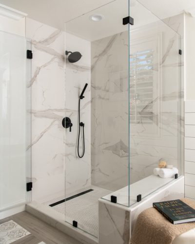 Porcelain-shower-remodel-with-black-fixtures-for-bold-design